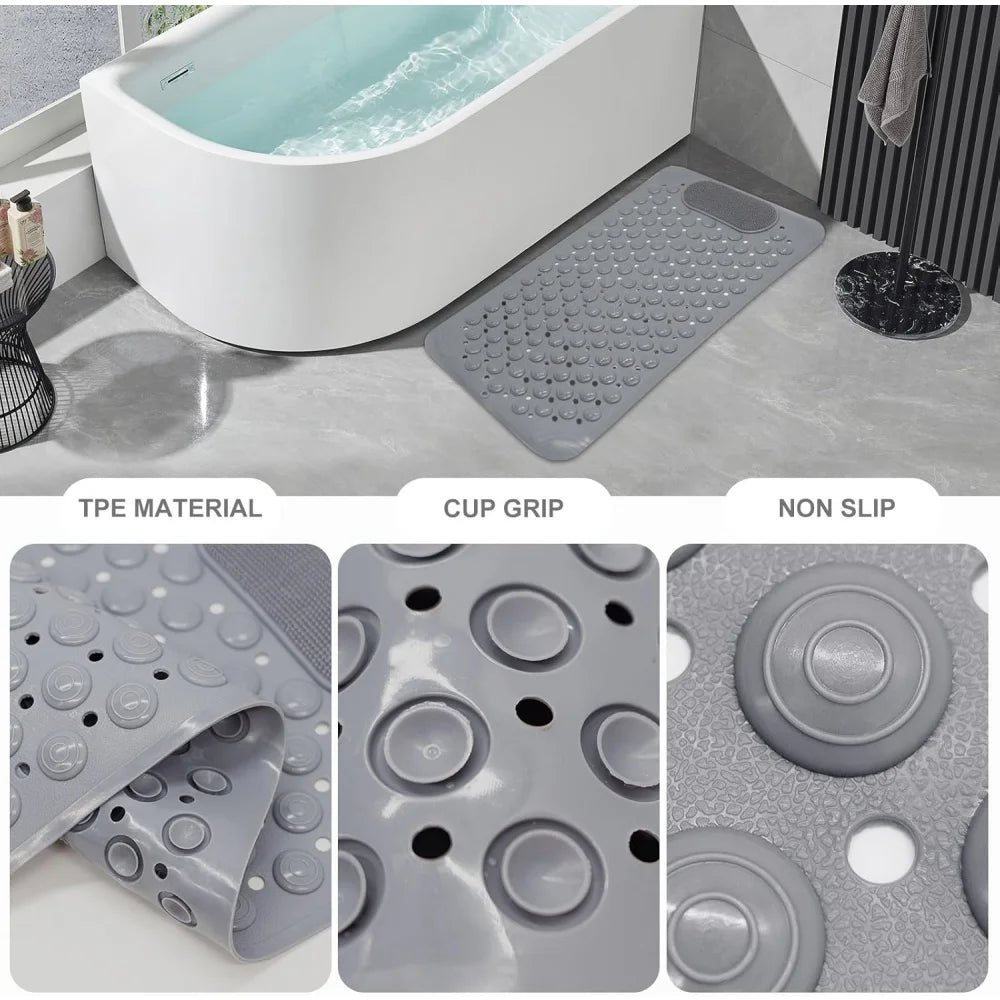 Una alfombrilla de baño para masaje gris antideslizante junto a una bañera blanca, destacando su material TPE y agarre tipo c