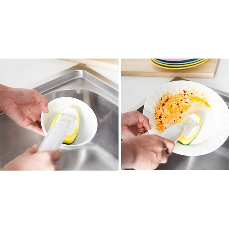 Hands are using a dish wand cleaning brush set to wash food in a stainless steel sink.