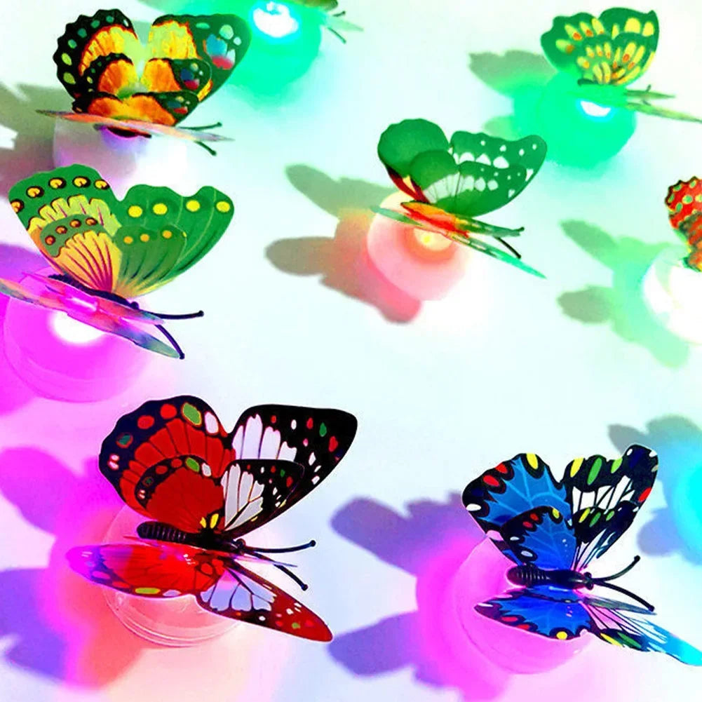 A luminous 3D butterfly wall light featuring colorful, translucent butterflies casting shadows.