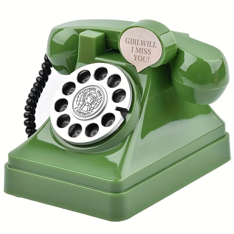 A vintage green retro phone money jar with a silver dial and a tag that reads I miss you