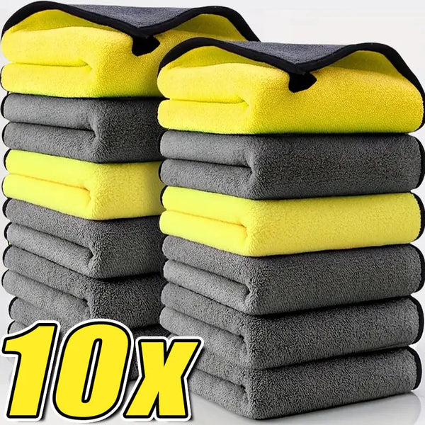A stack of yellow and gray multi-purpose microfiber cleaning towels.