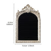 Support de bijoux rectangulaire noir avec cadre argenté orné et dessus décoratif.