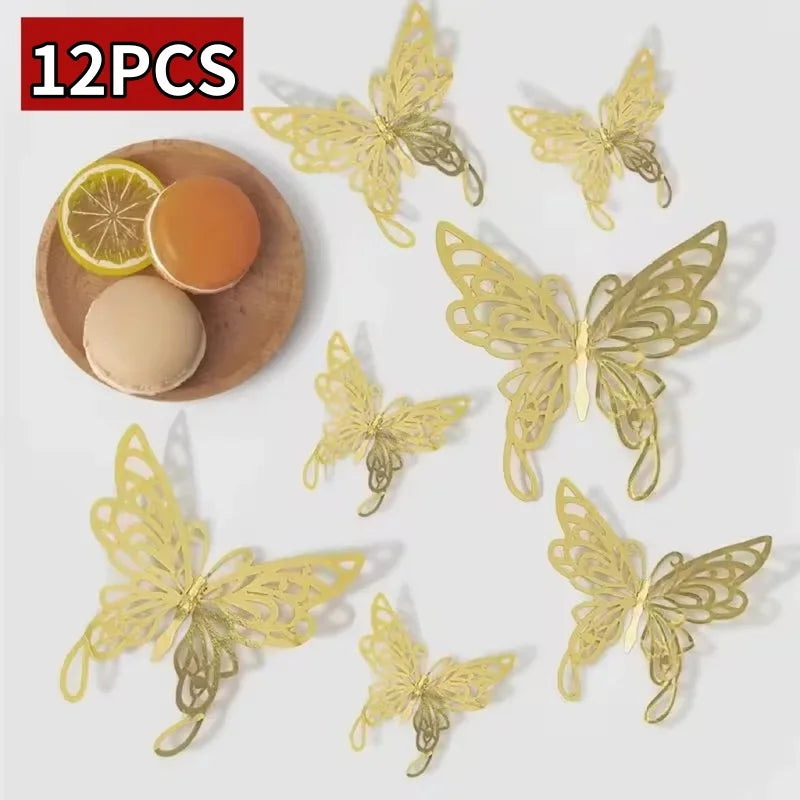 A set of twelve gold-colored 3D decorative butterfly wall stickers displayed next to a slice of lemon and a round object.