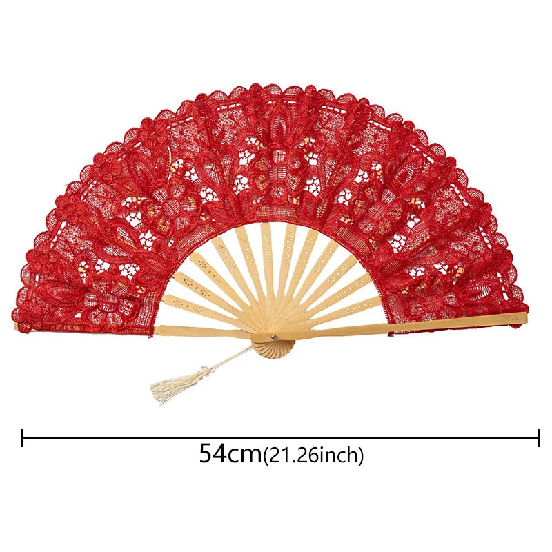 A red lace folding handheld fan with a sunburst design and wooden handle.
