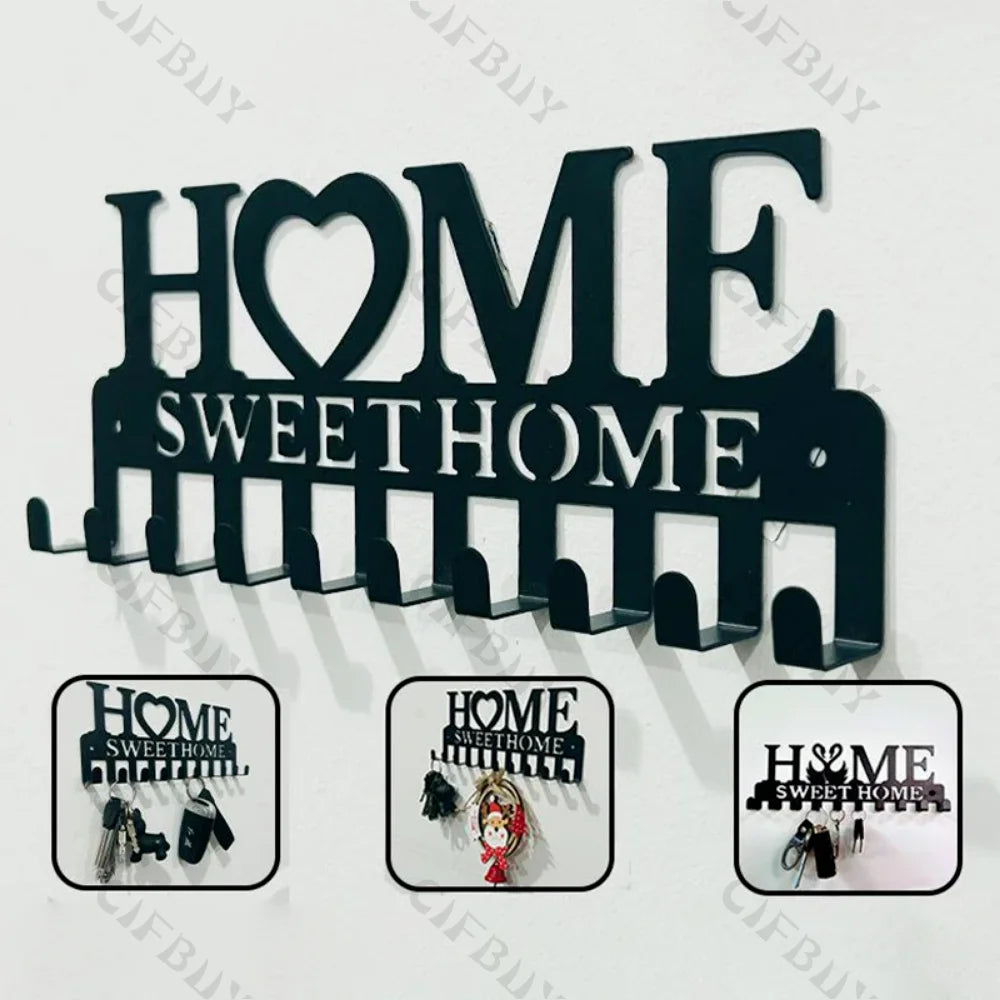 Black rustic metal wall hook key holder displaying the words HOME SWEET HOME
