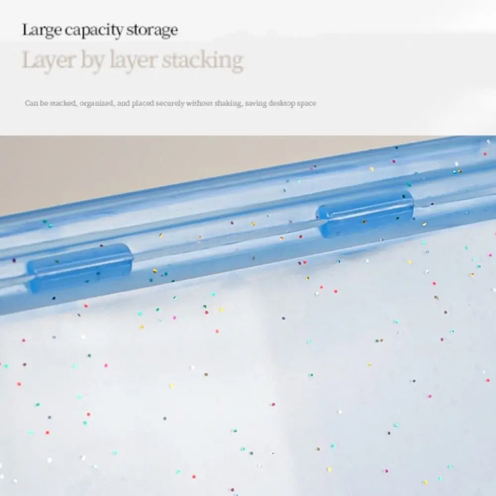 A clear plastic storage box with a blue lid is shown, demonstrating layer by layer stacking for large capacity storage.