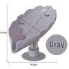 Gray leaf-shaped suction cup soap dish with dimensions 13cm long and 10.5cm wide.