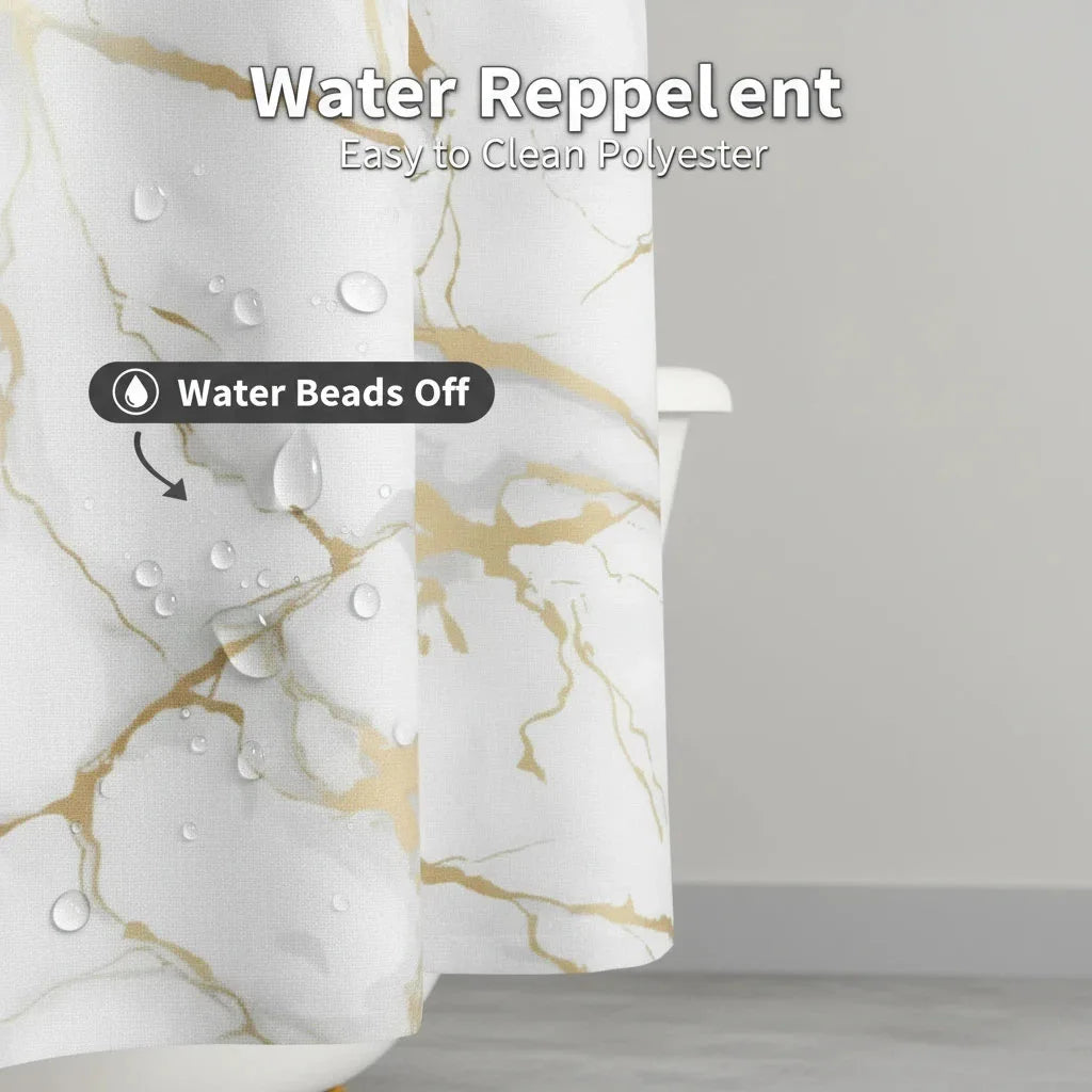 Close-up of a white and gold marble pattern shower curtain showing water beads off the fabric.