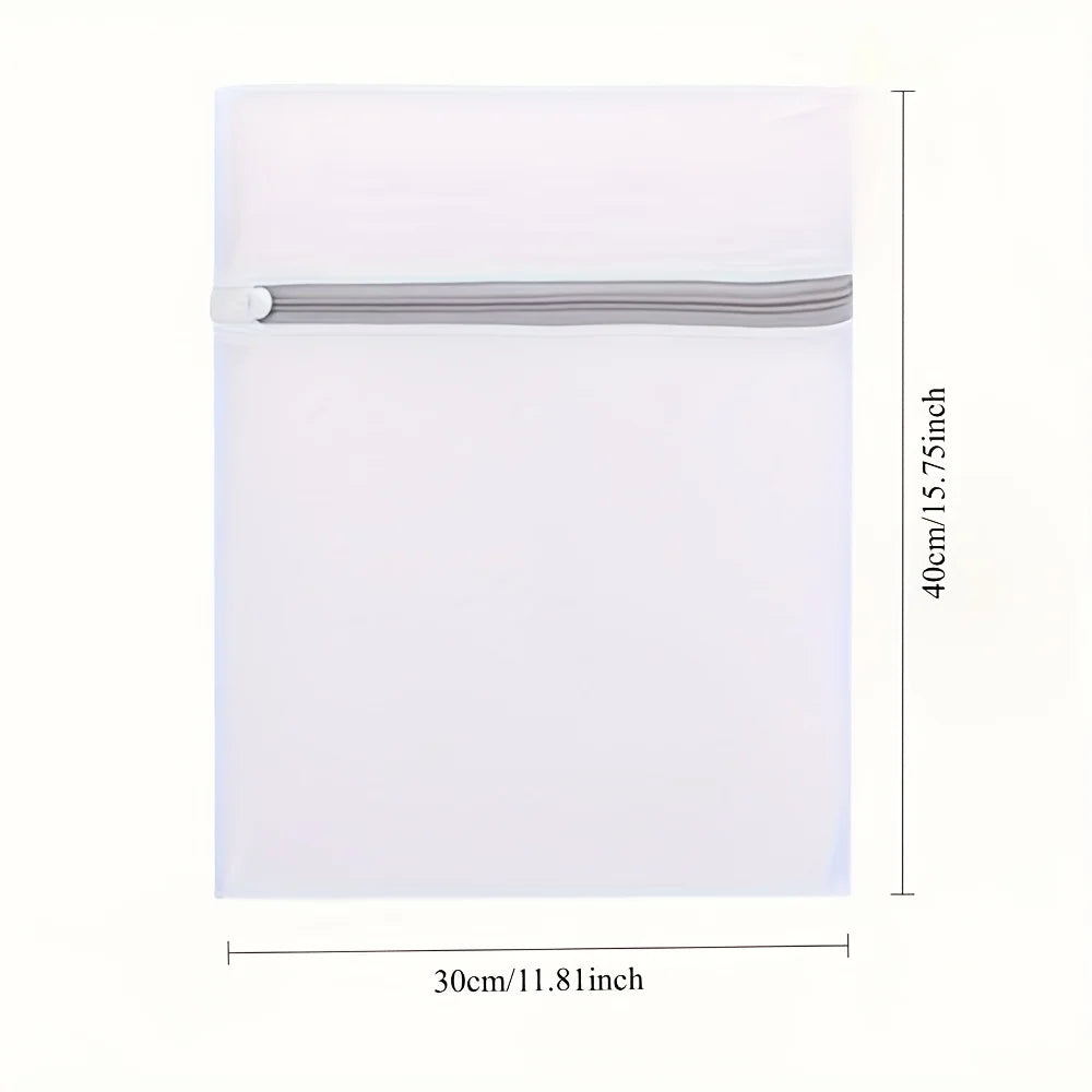 A white fine mesh laundry bag with a gray zipper closure shown flat.