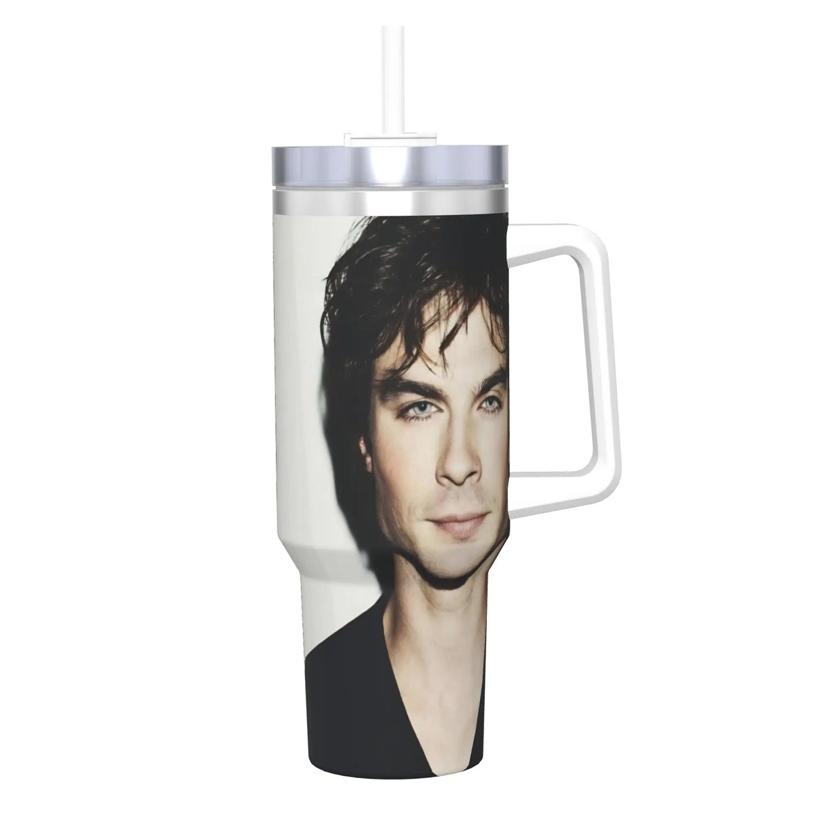 A clear stainless steel thermal tumbler with a silver straw featuring a portrait of a man.