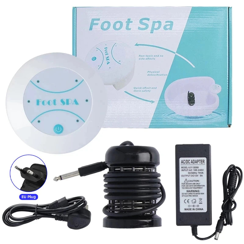 A white ionic foot spa bath massager device with an adapter and power cord shown next to its packaging.