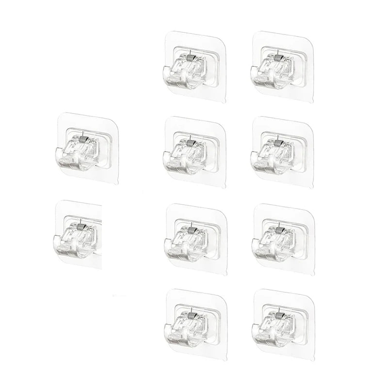 A set of ten self-adhesive curtain rod hooks in various sizes and finishes.