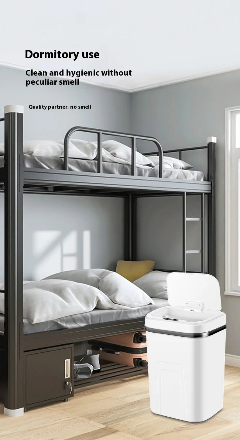 A gray metal bunk bed with bedding and a white touchless sensor trash can on the floor.