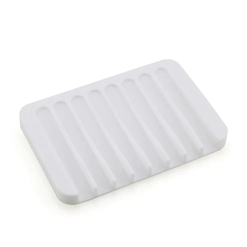 White self-draining silicone soap dish with an anti-slip base