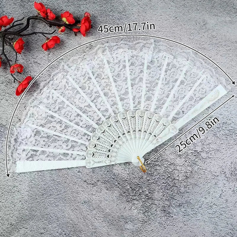 White lace fabric folding hand fan with red accents shown against a gray background