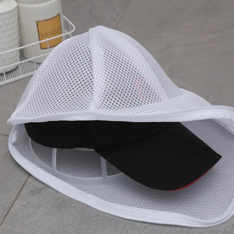 White mesh reusable laundry bag designed to protect hats from dirt and debris