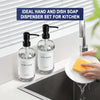A set of clear glass hand and dish soap dispensers with stainless steel pumps on a kitchen counter.