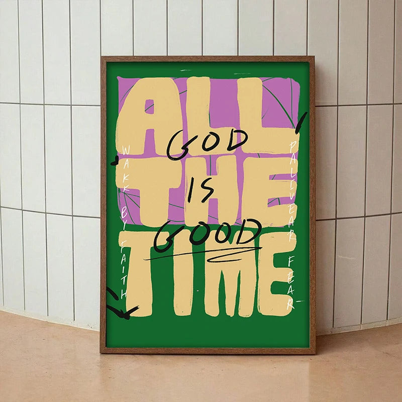 A framed canvas art print featuring the text ALL GOD IS THE GOOD TIME in yellow and purple lettering on a green background.