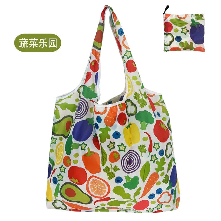 Wiederverwendbare Tasche mit farbenfrohen Illustrationen von Obst und Gemüse.
