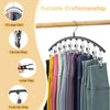 Curved metal hangers with 10 clips used to organize clothing on a wooden rod.