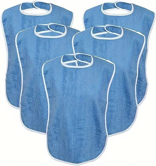 Three light blue protective bibs or aprons with white trim displayed together.