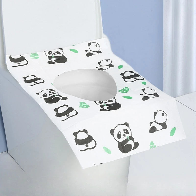 White disposable printing seat covers featuring a pattern of cute panda faces.