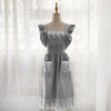 Gray cotton linen kitchen apron with lace detail displayed on a mannequin.