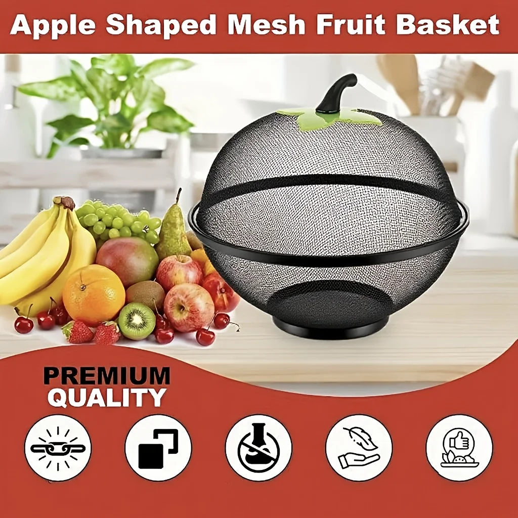 Black apple-shaped mesh fruit basket with a green accent, shown on a wooden surface.