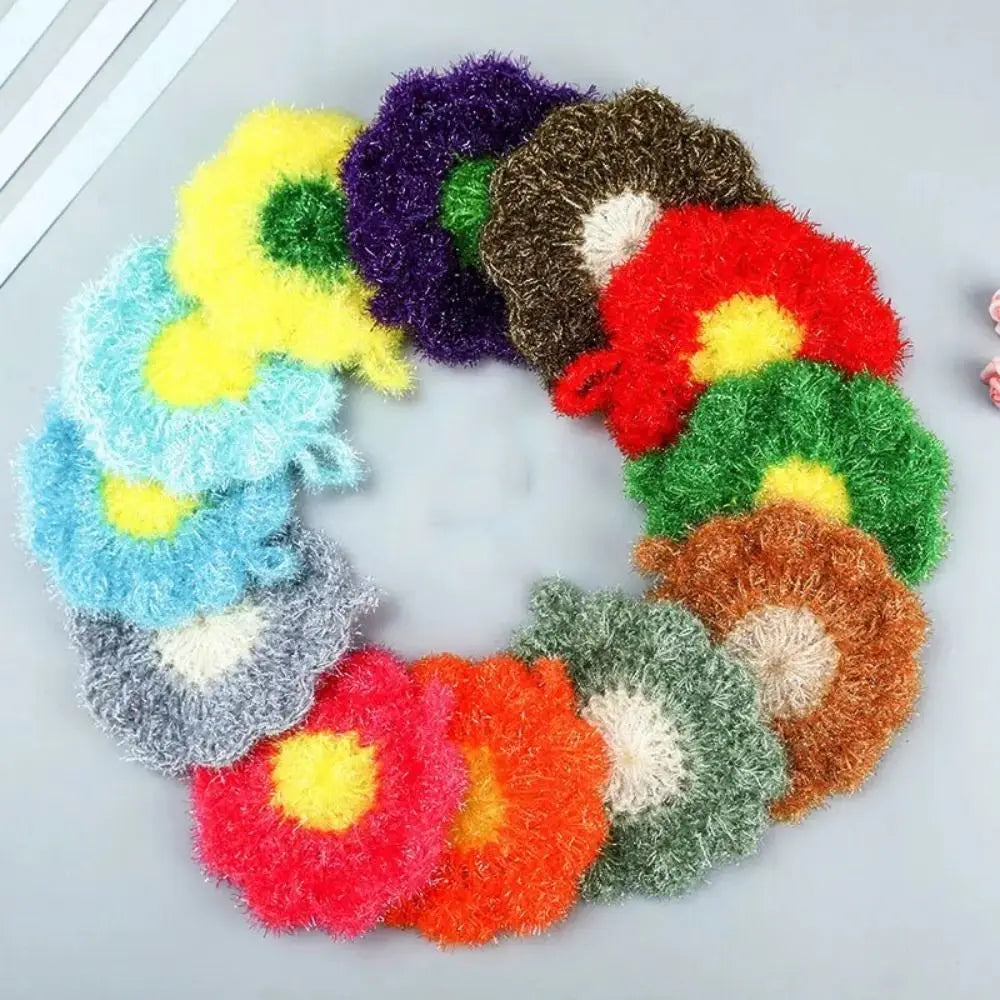 A wreath of colorful non-stick acrylic dish towels in various shades including purple, yellow, green, and red.