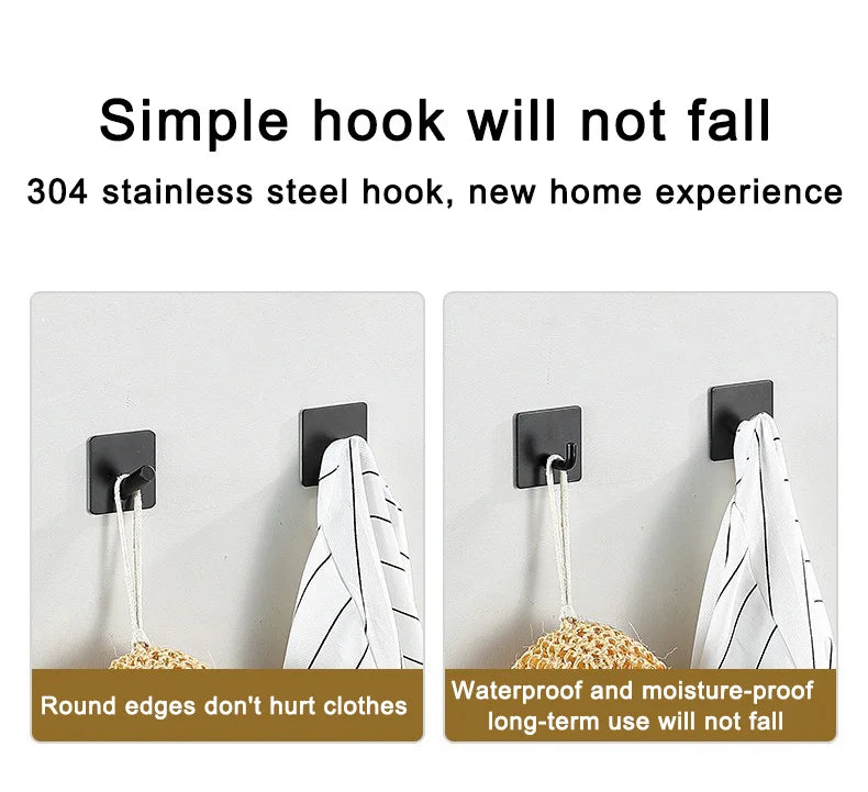 A stainless steel hook hanging on a white wall, demonstrating a simple hook that will not fall.