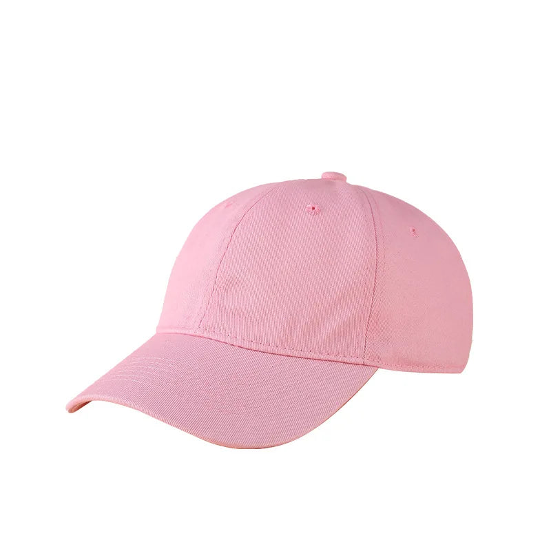 A pink customizable cotton baseball cap shown from the side.