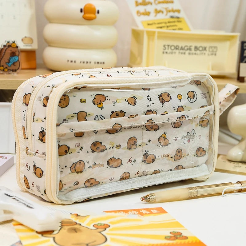 A beige dual-sided transparent pencil pouch with a pattern of small brown bears and yellow accents.