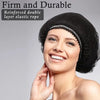 A woman is smiling while wearing a black bouffant hair net cover made of reinforced double layer elastic rope.