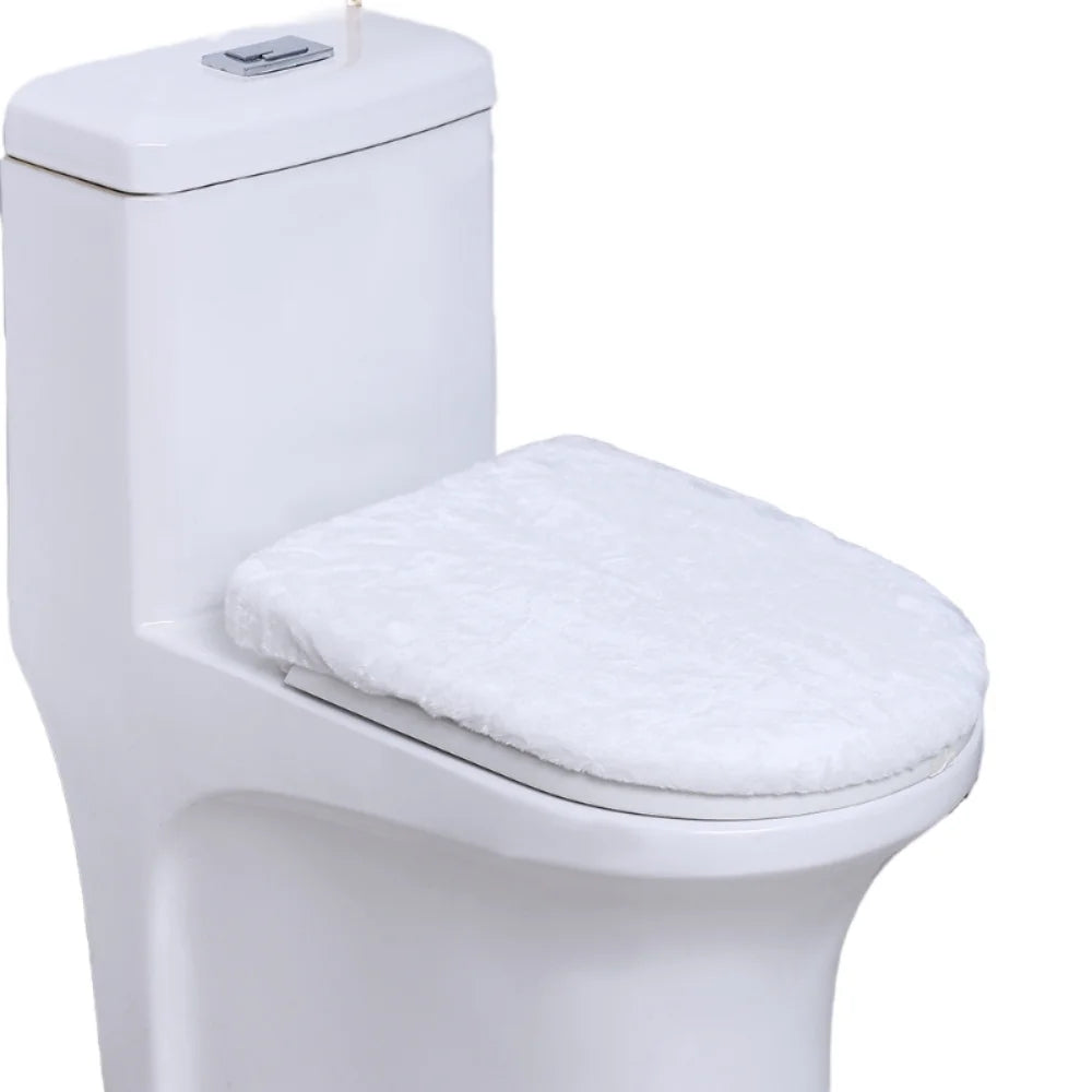 A white protective toilet seat cover is shown on a standard white toilet bowl.