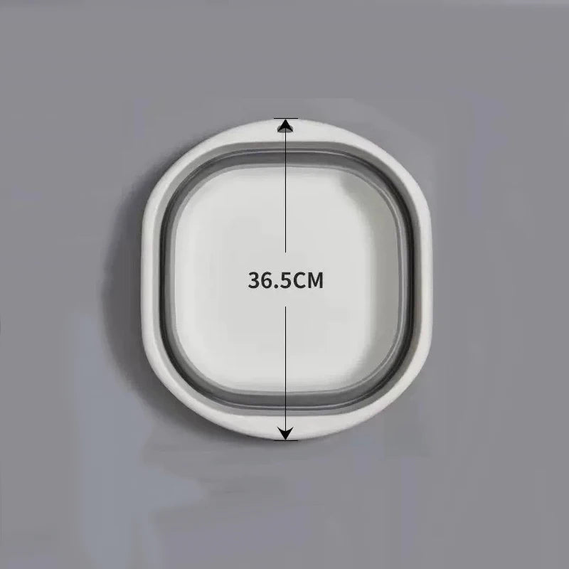 A white, oval-shaped plastic wash basin with dimension markings showing a depth of 36.5 cm.