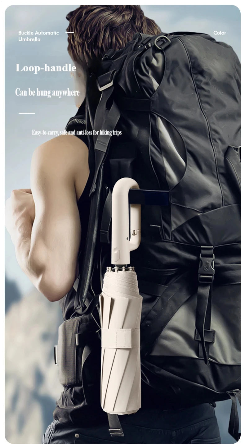 A person is wearing a black backpack and holding a light beige folding umbrella.