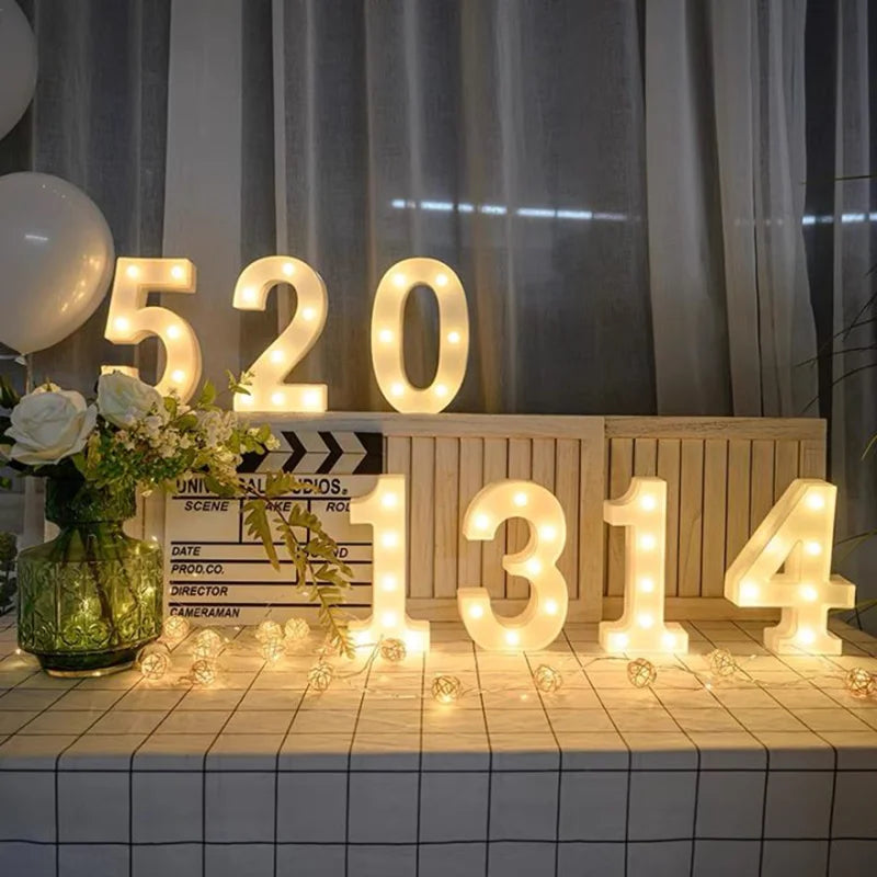 Golden LED numbers 520 and 1314 are displayed on a wooden surface with white tiles.
