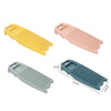 Three plastic washing boards in yellow, pink, and blue shades shown from the side.