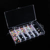 A clear storage box for nail art supplies with multiple compartments filled with colorful glitter and embellishments.