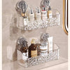Stainless steel suction cup storage rack for bathroom displaying various skincare products.