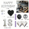 A set of silver balloons including letter shapes, round balloons, and heart-shaped balloons for birthday parties