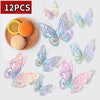 A set of twelve colorful, iridescent butterfly wall stickers displayed on a white background.