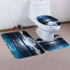 A toilet featuring a decorative seat and a matching floor mat with an underwater scene.