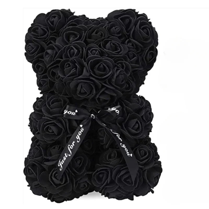 A bouquet of black artificial roses tied together like a teddy bear for special occasions