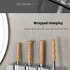 Wall mounted broom holder with soft silicone grips for easy gripping