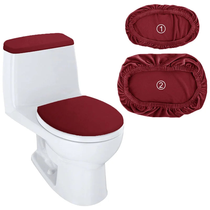 A white toilet seat with a maroon lid and two separate velvet protectors shown in a package.