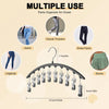 Curved metal hangers with 10 clips used as a pants organizer for closet storage.
