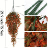 A long, cascading garland of artificial reddish-brown leaves and small flowers.