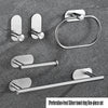 A five-piece set of silver perforation-free towel rings and bars for bathroom use.