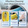 A hand places yellow footwear inside a blue laundry bag for effortless cleaning in a washing machine.
